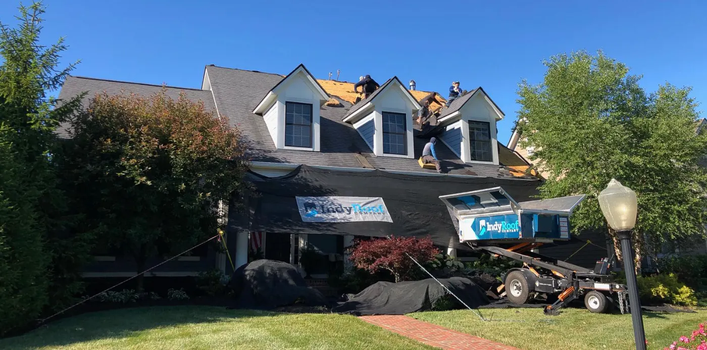 Storm damage documented on a Lake Hart home